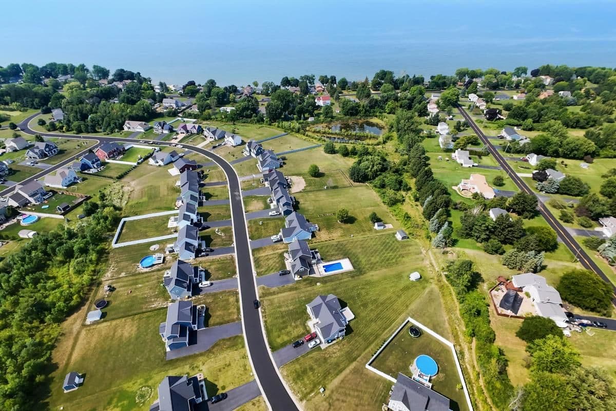 Wide aerial of a growing housing development