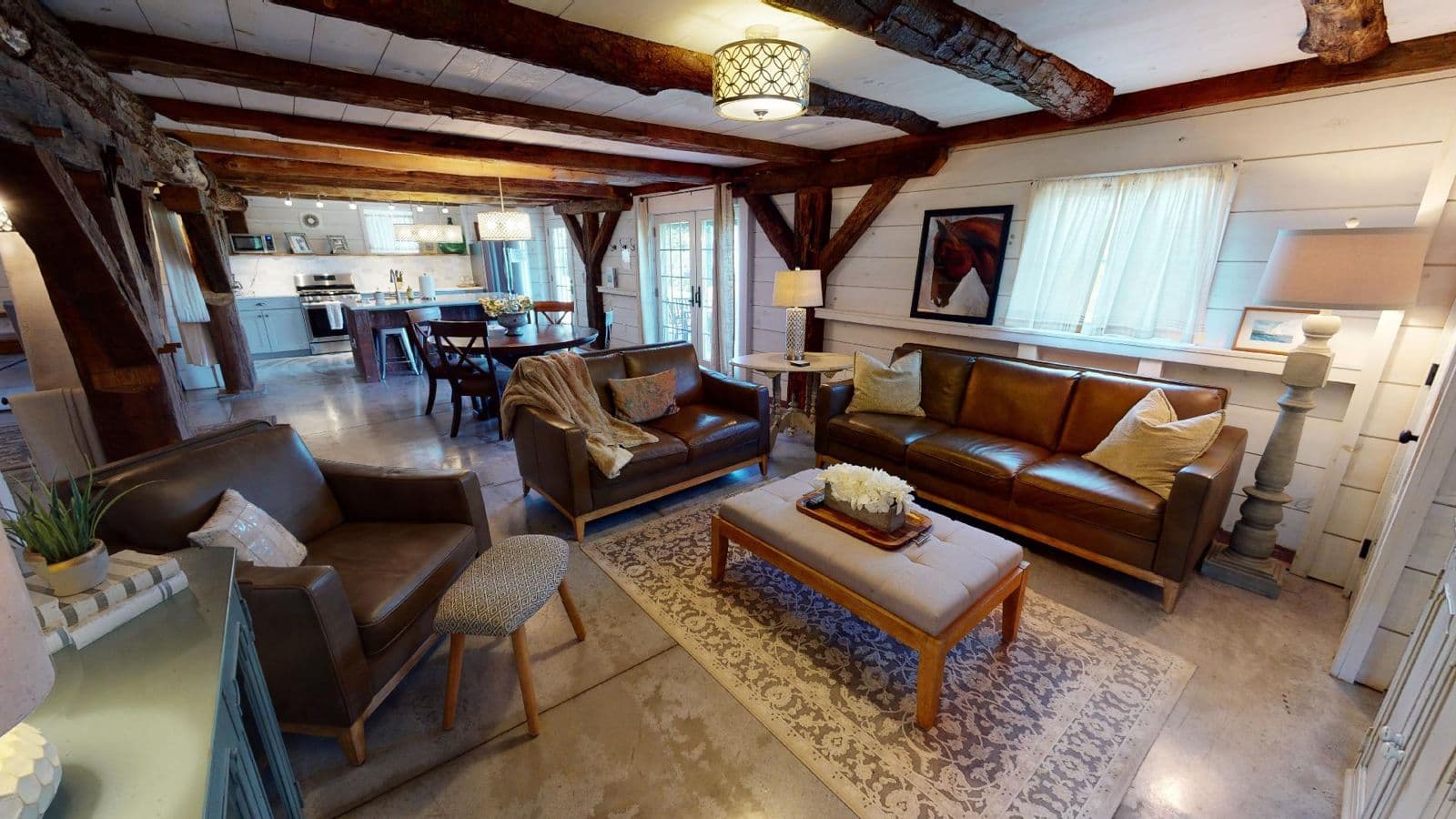 Barn living room with leather sofas