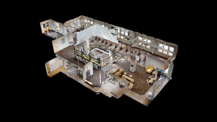 3D dollhouse view of a commercial building